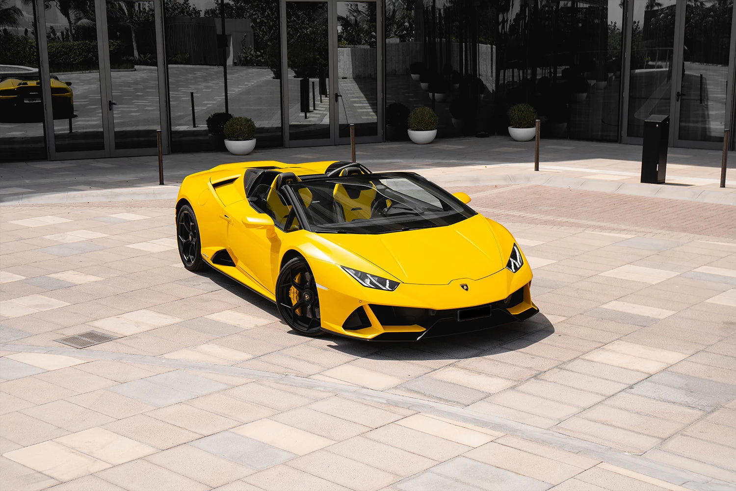 2022 Lamborghini EVO Spyder convertible rental Dubai – exotic supercar rental with airport delivery by OX4 Car Rental