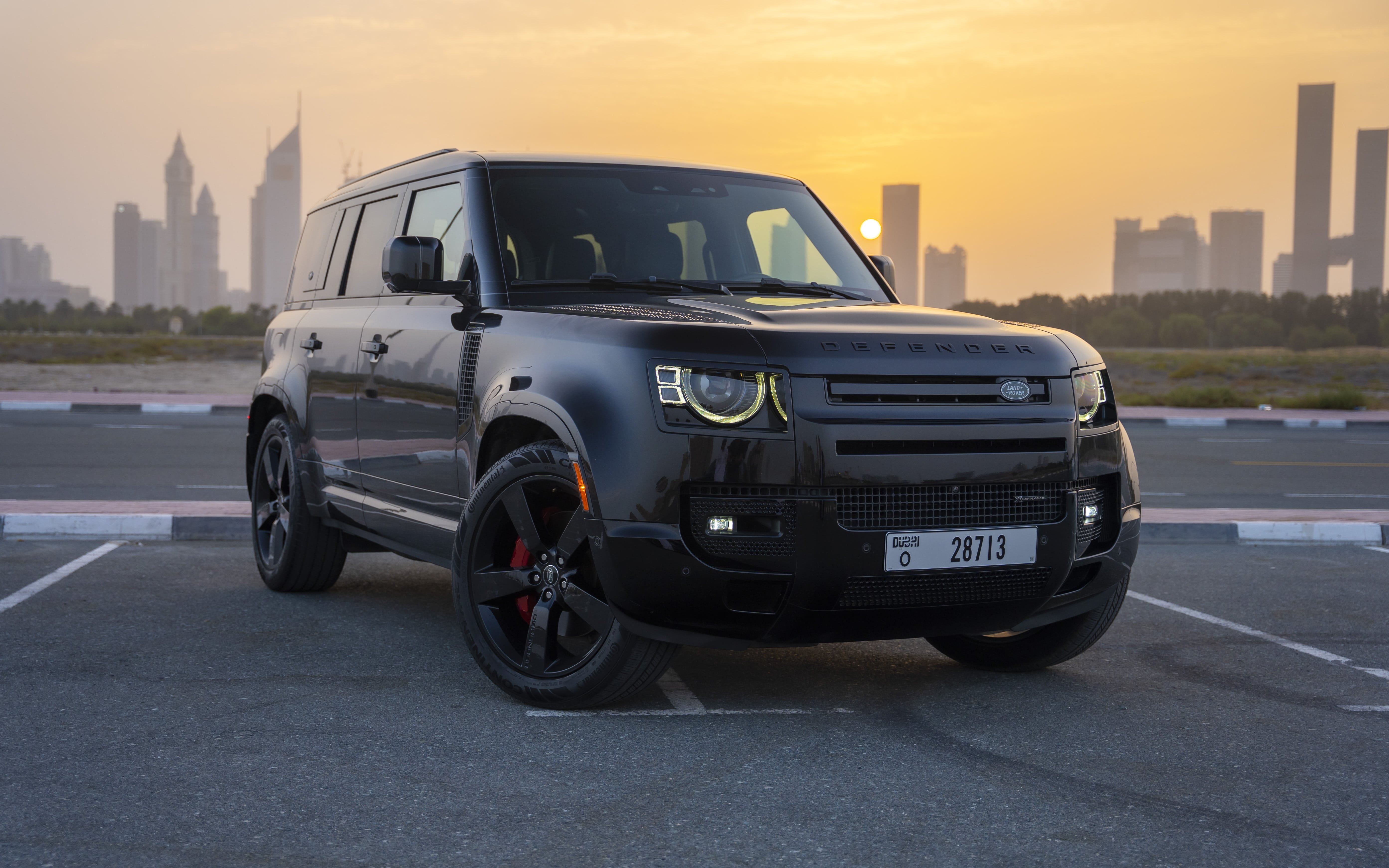 2022 Land Rover Defender 110 rental Dubai – rugged luxury SUV rental with airport delivery by OX4 Car Rental