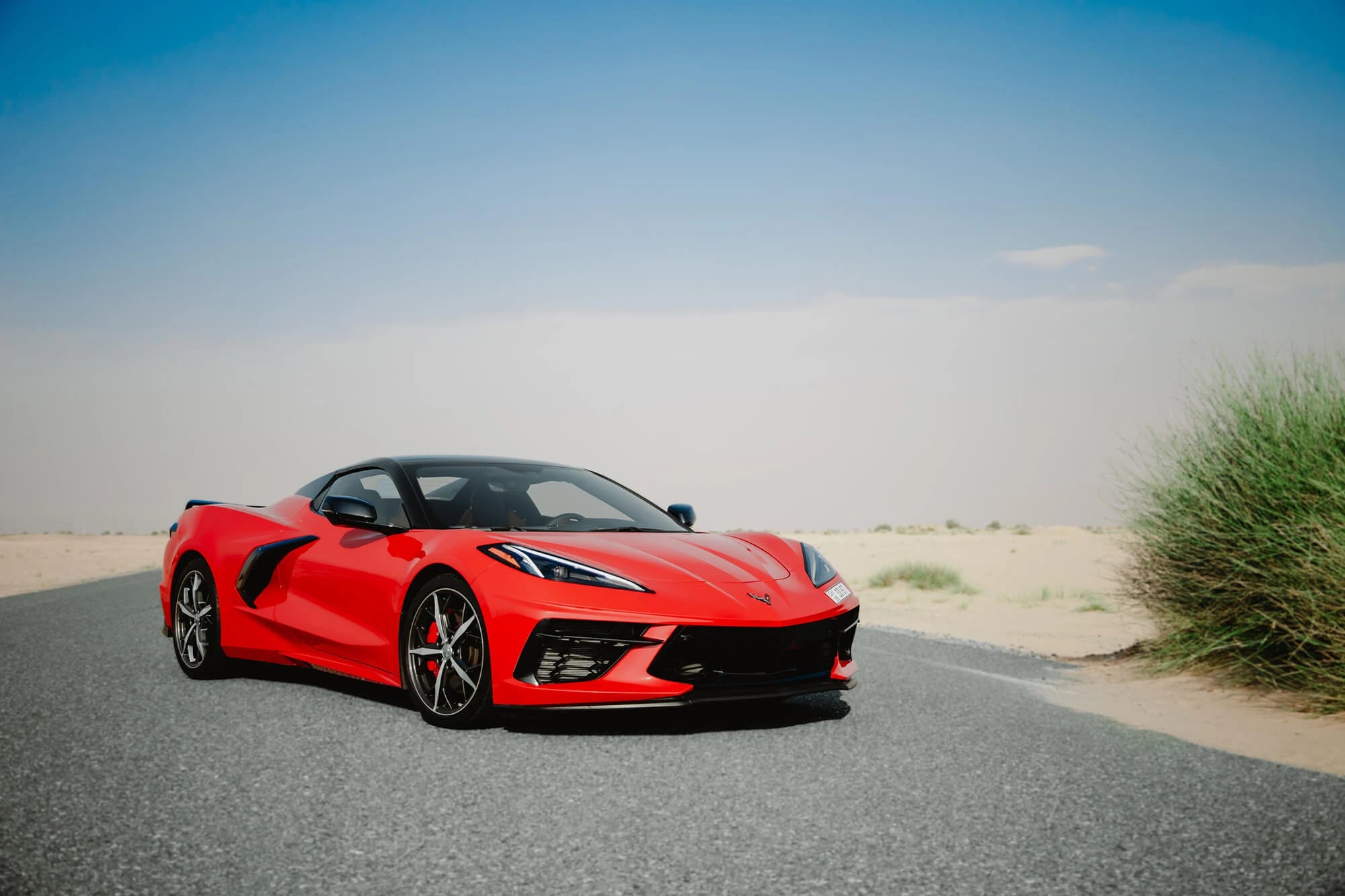 2021 Chevrolet Corvette C8 Red convertible rental Dubai – exotic supercar rental with airport delivery by OX4 Car Rental