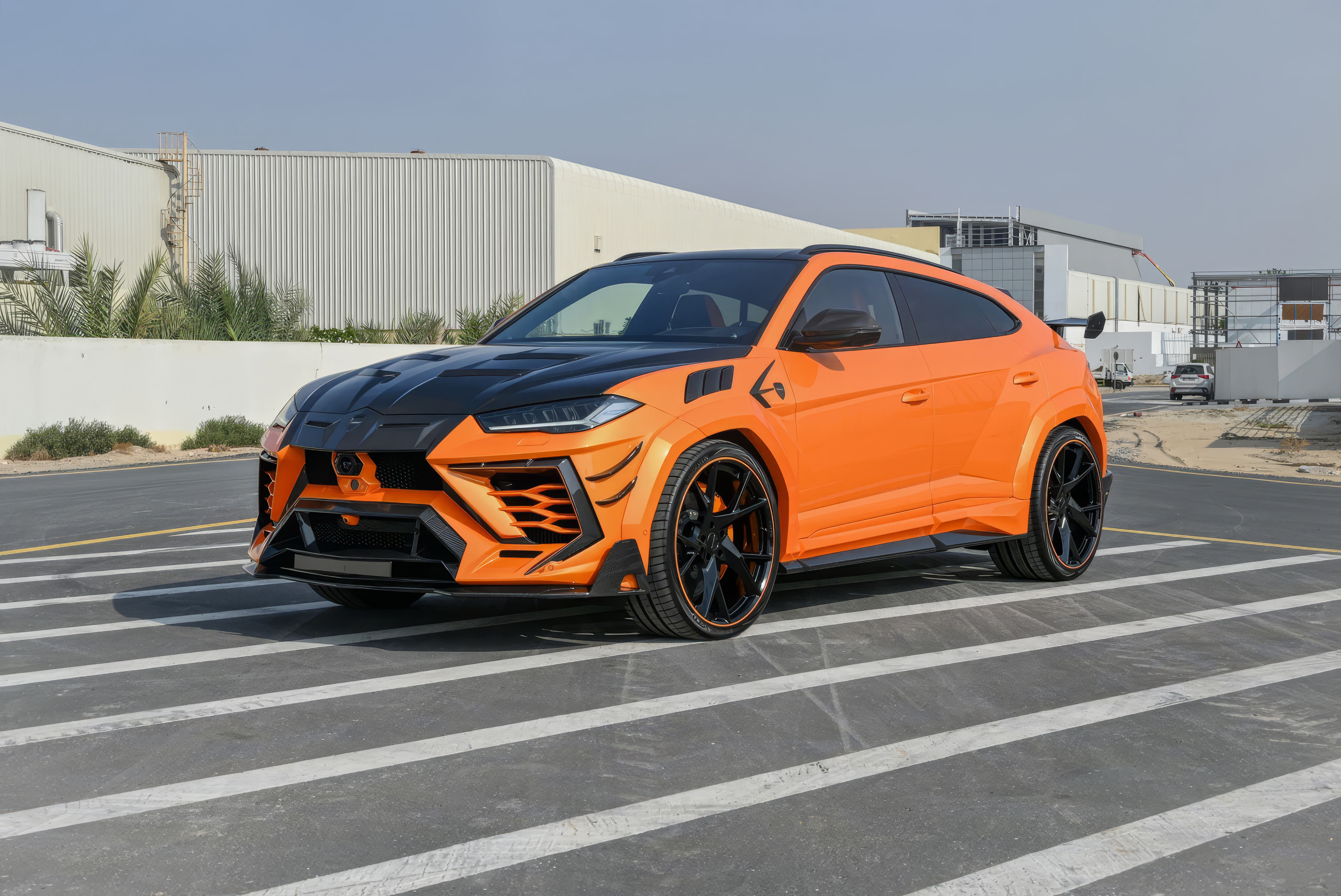 2021 Lamborghini Urus Mansory Orange rental Dubai – exotic luxury SUV with airport delivery by OX4 Car Rental